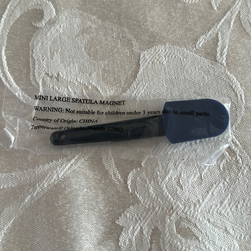 Miniature tupperware replica magnet of spatula